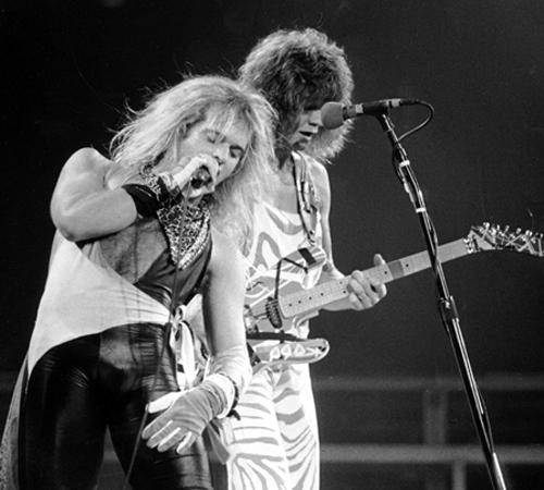 Lead singer David Lee Roth, left, and lead guitarist Eddie Van Halen of the rock group Van Halen perform during the concert at the spectrum in Philadelphia in this Oct. 19, 1982 file photo. The rockers have re-formed with original frontman David Lee Roth The Associated Press

