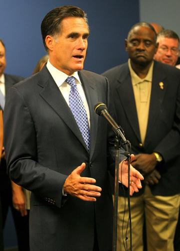Republican Presidential candidate Mitt Romney speaks at Willard Airport in Champaign Friday morning. Romney was visiting Champaign to meet with local supporters for a fundraising luncheon. ME Online
