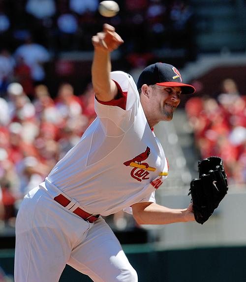 St. Louis starting pitcher Braden Looper throws against Cincinnati on Sunday in St. Louis. Looper, a career reliever, has filled in well in the rotation this year. THE ASSOCIATED PRESS, BILL BOYCE
