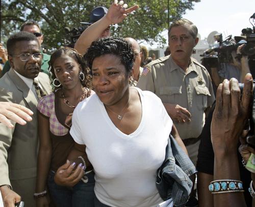 Melissa Bell, center, leaves after a hearing for her son Mychal Bell at LaSalle Parish Courthouse in Jena, La., Friday, Sept. 21, 2007. A relative of one of the group of black teenagers known as the "Jena Six" said a judge denied bail Friday for Alex Brandon, The Associated Press
