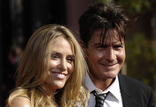 Actor Charlie Sheen and his fiance Brooke Mueller arrive at the 59th Primetime Emmy Awards Sunday, Sept. 16, 2007, at the Shrine Auditorium in Los Angeles. Chris Pizzello, The Associated Press
