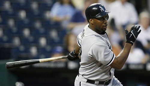 Jermaine Dye drives the ball into right field for an RBI single in the first inning against the Kansas City Royals on Wednesday in Kansas City, Mo. The White Sox won, 7-0. THE ASSOCIATED PRESS, ED ZURGA
