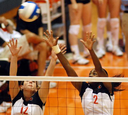 Freshman Laura DeBruler puts down one of her 19 kills during the 3-0 victory over SIU on Wednesday night. The Illini play Toledo this weekend. Erica Magda
