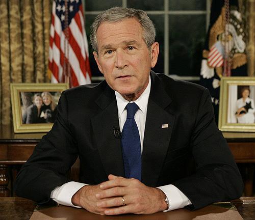 President George W. Bush pauses in the Oval Office at the White House on Thursday night after addressing the nation on his strategy for Iraq. THE ASSOCIATED PRESS, J. SCOTT APPLEWHITE
