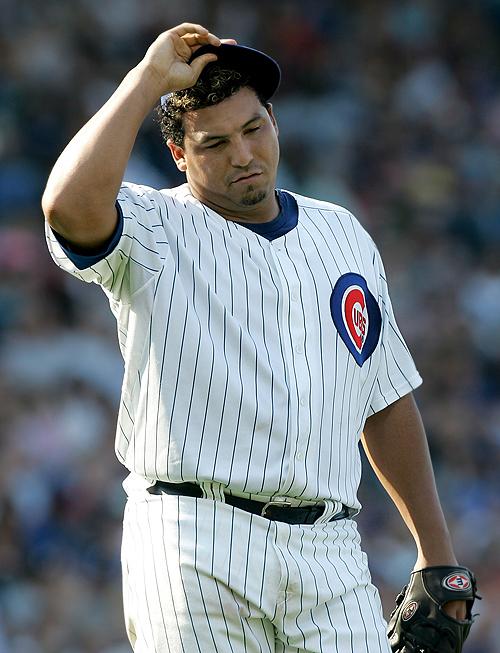 Chicago+Cubs+pitcher+Carlos+Zambrano+adjusts+his+cap+during+the+fifth+inning+against+the+Los+Angeles+Dodgers+at+Wrigley+Field+in+Chicago+on+Monday.+THE+ASSOCIATED+PRESS%2C+BRIAN+KERSEY%0A