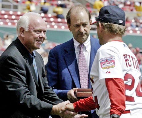 Cardinals general manager Walt Jocketty, left, takes part along with team owner Bill DeWitt Jr., center, in a presentation at Busch Stadium in this April 10, 2005 file photo. Jocketty is now out as general manager after 13 seasons. THE ASSOCIATED PRESS, JAMES A. FINLEY
