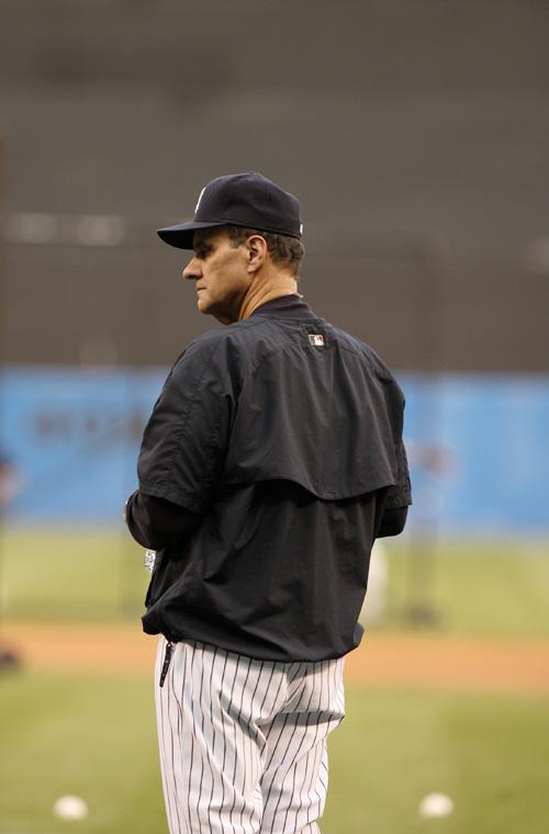 Joe Torre reflects on the field before ALCS Game 4 in New York, on Oct. 8. THE ASSOCIATED PRESS, KATHY WILLENS
