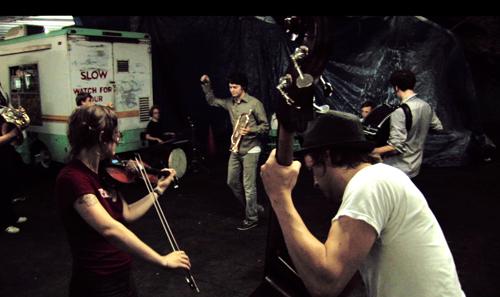 This undated video screen shot provided by La Blogotheque shows the band Beirut performing its song Cherbourg in a garage in Brooklyn, N.Y., as part of the videos created by the filmmakers of La Blogotheque. The Associated Press, La Blogotheque
