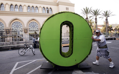 Stagehand Joe Tuttle pushes one of the oversized letters of the Fox television network sign during preparation for the 59th Primetime Emmy Awards outside the Shrine Auditorium in Los Angeles on Sept. 13. From "green carpets" at awards shows to organic fru Laura Prusik
