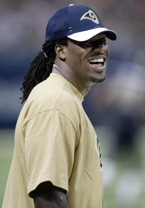 St. Louis Rams running back Steven Jackson smiles as he stands on the sidelines during an NFL football game against the Arizona Cardinals on Oct. 7, 2007, in St. Louis. After missing four games with a partially torn groin muscle, Jackson practiced with th Erica Magda
