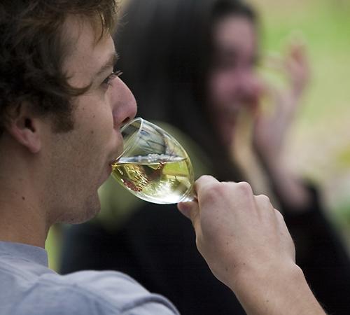 David Wells, graduate student, sips on wine at Alto Vineyards on Duncan Road in Champaign on Tuesday afternoon. Wells and his friends come to the Vineyards every Tuesday to drink wine. This is known as Alto Tuesday, Wells said of his weekly v Erica Magda
