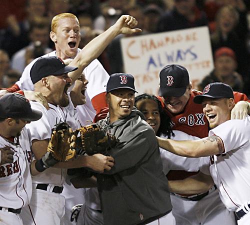 ed Sox players celebrate their ALCS Game 7 victory on Sunday. They host the Rockies on Wednesday. Erica Magda
