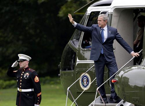 President Bush waves from the steps of Marine One on Wednesday shortly after vetoing a bill that would have expanded a popular health care program for children by $35 billion. Bush was leaving for a day trip to Lancaster, Pa. THE ASSOCIATED PRESS, RON EDMONDS
