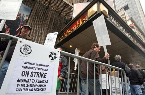 Stagehands picket the Broadway musical "Les Miserables," Saturday, in New York. More than two dozen plays and musicals were shut down as stagehands went on strike on what is the most popular theatergoing day of the week. Diane Bondareff, The Associated Press
