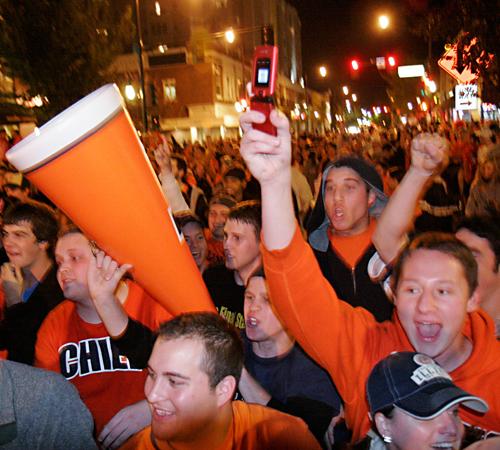 A crowd of Illinois football fans celebrate the 28-21 victory over No. 1 ranked Ohio State on Green Street in Champaign, Ill., Saturday, Nov. 10, 2007. Traffic East and Westbound was shut down between Wright and Fifth Streets on Green as students paraded Erica Magda
