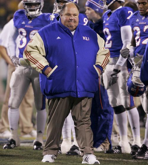 Kansas coach Mark Mangino walks the sidelines against Missouri at Arrowhead Stadium on Saturday in Kansas City, Mo. Orlin Wagner, The Associated Press
