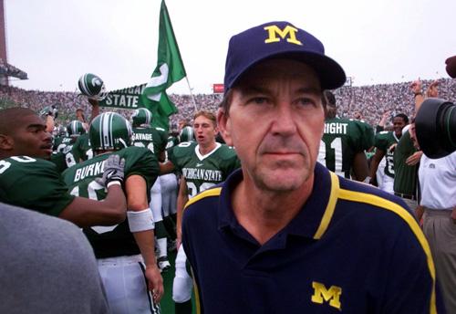 Michigan+coach+Lloyd+Carr+walks+off+the+field+after+a+34-31+loss+against+Michigan+State+in+East+Lansing%2C+Mich.%2C+on+Oct.+9%2C+1999.+Erica+Magda%0A
