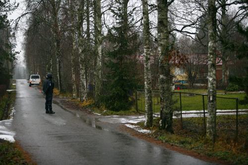 Pupils are evacuated from Jokela High School in Tuusula, Finland, on Wednesday after a teenager opened fire at his school, killing eight - seven students and the principal - before taking his own life. The Associated Press, Seppo Samuli
