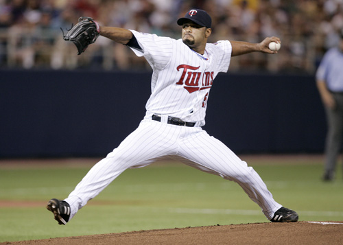 Minnesota Twins pitcher Johan Santana throws against the Oakland Athletics on July 13, in Minneapolis. The Twins face a predicament with the all-star, their first choice being to sign him after losing Torii Hunter. Jim Mone, The Associated Press

