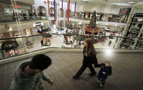 Shoppers walk through the Cherryvale mall in Rockford, Ill., in this Dec. 8, 2006, file photo. Derrick Shareef, a resident of Rockford who was charged in a plot to set off hand grenades in garbage cans at the mall in December 2006, pleaded guilty to the a M. Spencer Green, The Associated Press
