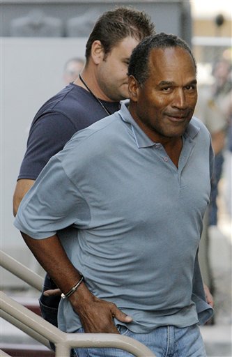O.J. Simpson is transferred to the Clark County Detention Center in Las Vegas, in this Sept. 16, 2007 file photo, after being arrested in connection with an alleged armed robbery in Las Vegas. When O.J. Simpson steps back into a courtroom to face armed ro Jae C. Hong, The Associated Press
