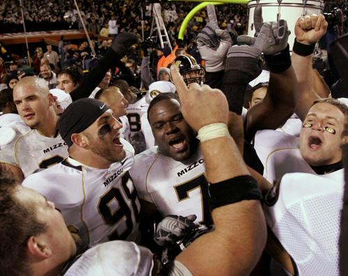 Missouri football players celebrate after defeating Kansas on Saturday at Arrowhead Stadium in Kansas City, Mo. The Tigers are ranked No. 1. Charlie Riedel, The Associated Press
