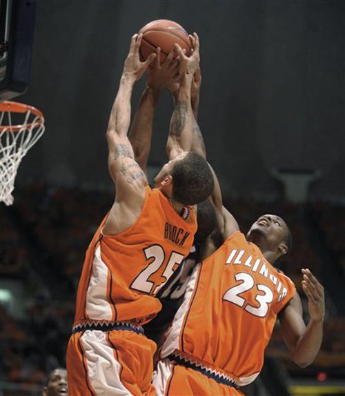 Illinois guard Calvin Brock (25) and forward Rodney Alexander (23) surround Penn State forward David Jackson (15) for a rebound during the first half of a basketball game Sunday, Jan. 6, 2008, in Champaign, Ill. Darrell Hoemann, The Associated Press
