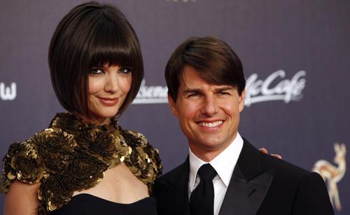US actor Tom Cruise, right, and Katie Holmes pose for the photographers on the red carpet prior to the Bambi media award ceremony in Duesseldorf, western Germany, in this Nov. 29, 2007 file photo. Holmes debuted a stylish bob this past summer and, all of Miguel Villagran, The Associated Press
