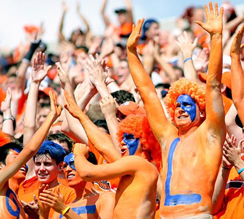 Illinois fans rejoice after a Rashard Mendenhall touchdown run during the upset against Wisconsin at Memorial Stadium in Champaign, on Oct. 6. Illinois won the game 31-26. Erica Magda
