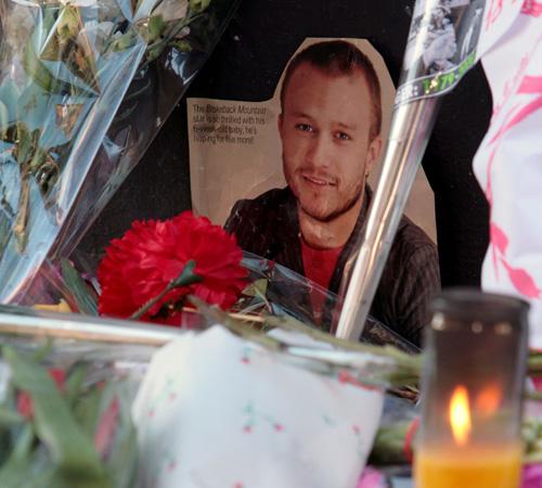 A makeshift memorial for the deceased actor Heath Ledger is seen, Wednesday, Jan. 23, 2008, outside the apartment building where his body was found in the SoHo neighborhood of New York. Authorities said the death was a possible overdose, but were awaiting Gary He, The Associated Press
