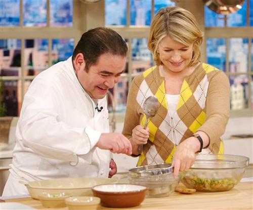 In this photo provided by The Martha Stewart Show, Martha Stewart and celebrity chef Emeril Lagasse work in the kitchen for a full hour to prepare a New Orleans-style Thanksgiving dinner featuring seafood gumbo, roasted turkey breast and oyster dressing Anders Krusberg, The Associated Press
