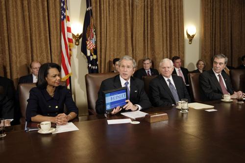 President Bush, second from left, speaks to the media after the release of the fiscal 2009 Federal Budget, on Monday, during a meeting with members of his cabinet in the Cabinet Room of the White House in Washington. Pablo Martinez Monsivais, The Associated Press
