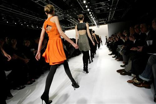 Models display fall fashions from Narciso Rodriguez during Fashion Week in New York, Tuesday, Feb. 5, 2008 Seth Wenig, The Associated Press
