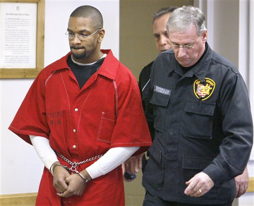 Former Canton police officer Bobby Cutts Jr. is lead into the Stark County Common Pleas courtroom of judge Charles E. Brown Jr. for a pretrial hearing at the Stark County Safety Center Friday, Jan. 18, 2008, in Canton, Ohio. Cutts has pleaded not guilty t Scott Heckel, The Associated Press
