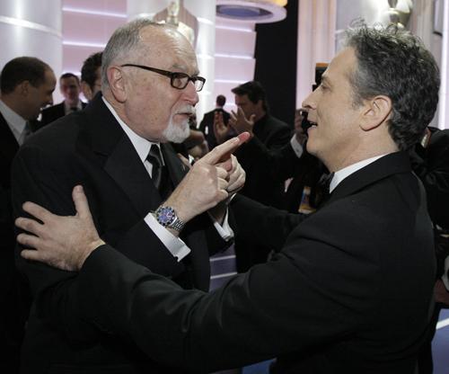 Oscar producer Gil Cates, left, is seen with host Jon Stewart at the conclusion of the 80th Academy Awards in Los Angeles, Sunday, Feb. 24, 2008. Chris Carlson, The Associated Press
