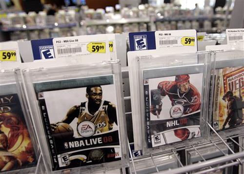 Two popular Electronic Arts games are seen on display at Best Buy in Mountain View, Calif. in this Oct. 15, 2007 file photo. Electronic Arts Inc. on Sunday, Feb. 24, 2008 said it was pushing ahead with a bid to take over upstart gaming rival Take-Two Inte Paul Sakuma, The Associated Press
