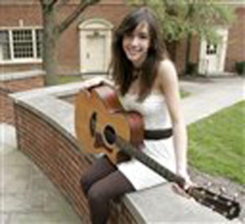 Kate Voegele poses outside her dormitory on the campus of Miami (Ohio) University, in this, April 3, 2007,file photo in Oxford, Ohio. Voegele appears for six episodes as Mia, the backup singer in a band fronted by a character played by Kevin Federline. Sh David Kohl, The Associated Press
