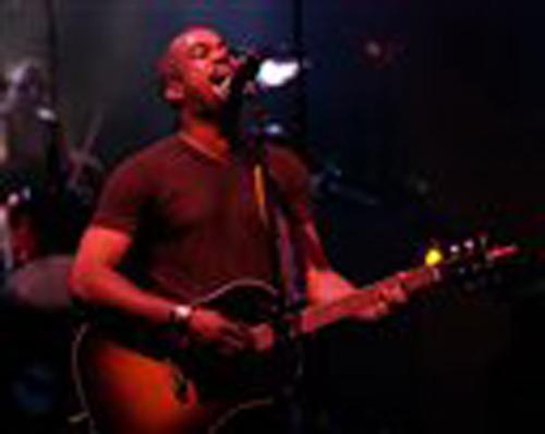 Darius Rucker, lead singer of the group Hootie and the Blowfish, performs in Orlando, Fla., in this March 15, 2003, file photo. The group will play at a fundraiser in Columbia, S.C., in March to benefit the Animal Mission, and when the bandmates get toget Doug Murray, The Associated Press
