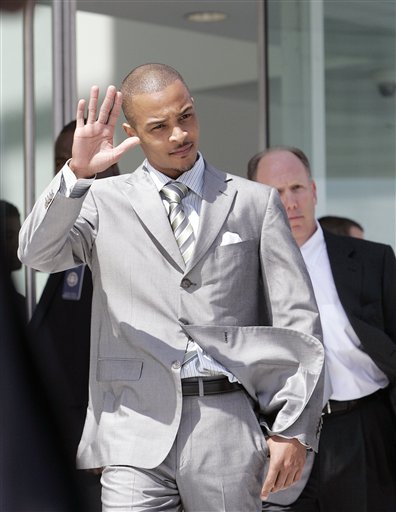 Rapper T.I. whose real name is Clifford Harris leaves the Richard B. Russell Federal Courthouse in Atlanta, Thursday, March 27, 2008. Rapper T.I. pleaded guilty Thursday to federal weapons possession charges, and will receive a sentence that includes pris John Bazemore, The Associated Press
