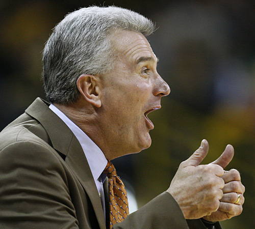Illinois coach Bruce Weber argues a call during the first half against Iowa on Saturday in Iowa City. The Illini defeated the Hawkeyes 58-47. The Associated Press
