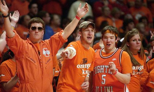 The Orange Krush stay on their feet and direct cheers during the game against Indiana at Assembly Hall on Feb. 7. Erica Magda
