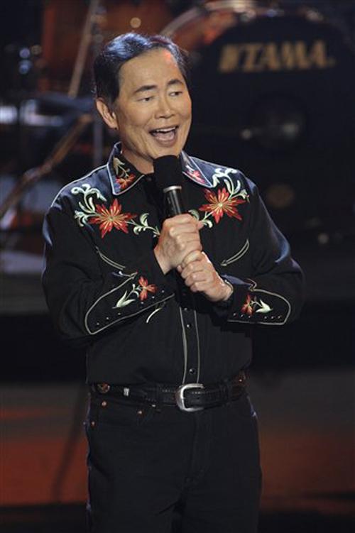 In this image released by CBS, actor George Takei sings a country song during the premiere of "Secret Talents of the Stars," on Tuesday in Los Angeles. Cliff Lipson, The Associated Press
