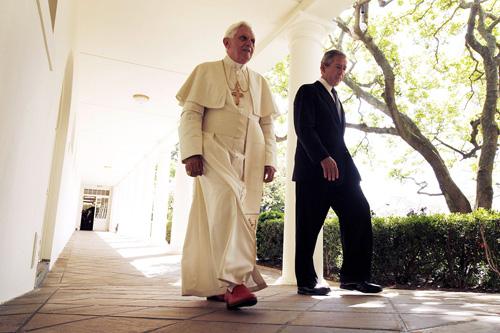 President Bush and Pope Benedict XVI walk down the Colonnade of the White House in Washington on Wednesday, following an arrival ceremony on the South Lawn. Gerald Herbert, The Associated Press
