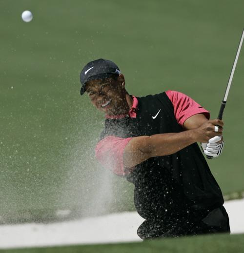 Tiger Woods hits out of a bunker on the second hole during the final round of the 2008 Masters golf tournament at the Augusta National Golf Club in Augusta, Ga., on Sunday. Elise Amendola, The Associated Press
