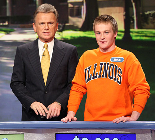 U of I student Mike Gaffney stands in front of the titular wheel with Pat Sajak, host of Wheel of Fortune, during College Week. His episode airs Friday. Photo Courtesy of Carol Kaelson

