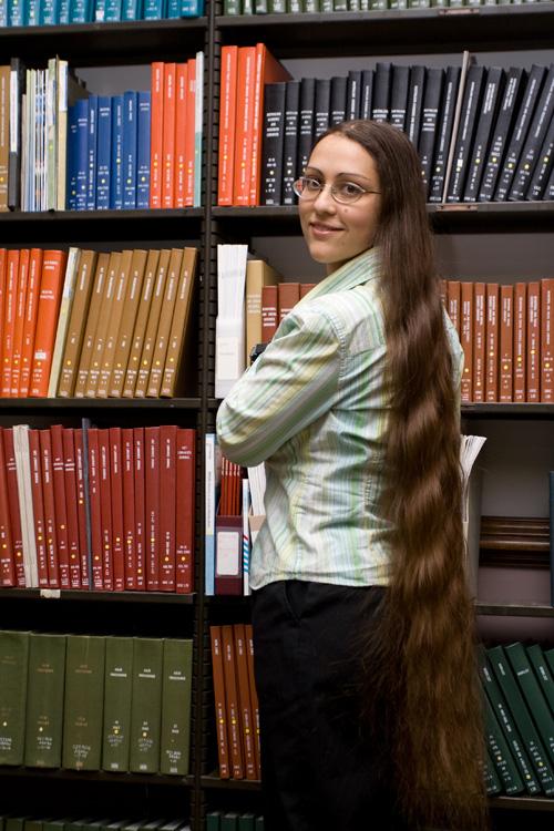 Sara Schepis, a graduate in Library & Information Science, has never had her hair cut in her life. When I was young, my mom just really liked long hair, Schepis said. I continued growing it because I love it long. Erica Magda
