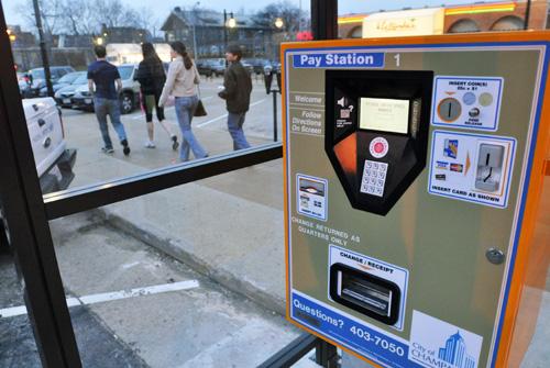 The parking lot at Sixth and Healey streets in Champaign has a new pay system. Erica Magda
