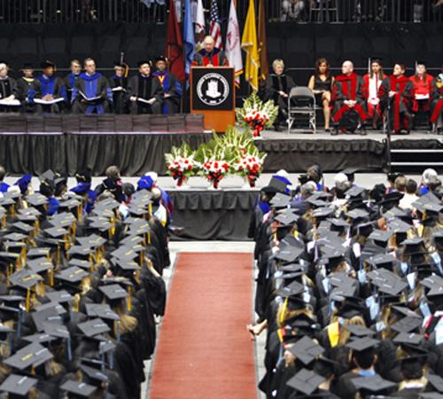 Northern Illinois University President John Peters addressed gathered students and members of the NIU community during commencement exercises in the Convocation Center on the NIU campus Saturday in DeKalb, Ill. Eric Sumberg, The Associated Press
