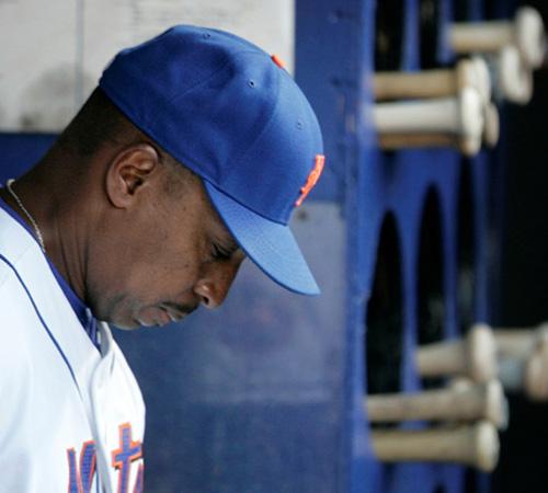 In this May 26 file photo, New York Mets manager Willie Randolph sits in the dugout before the start of the Major League Baseball game against the Florida Marlins at Shea Stadium in New York. After weeks of speculation that his job was in jeopardy, Willi Seth Wenig, The Associated Press
