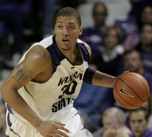 In this Nov. 17, 2007 file photo, Kansas State forward Michael Beasley drives during a college basketball game against Western Illinois in Manhattan, Kan. Derrick Rose or Michael Beasley? The Chicago Bulls have the No. 1 pick in the draft and a choice to Charlie Riedel, The Associated Press
